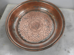 A Vintage Copper Colander With  Perforated Floral And Six Pointed Star