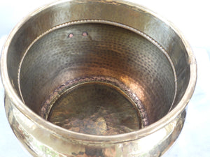 Brass pot belly planter with lions head handles