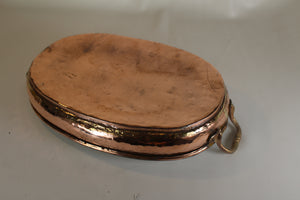 Hand beaten copper pan